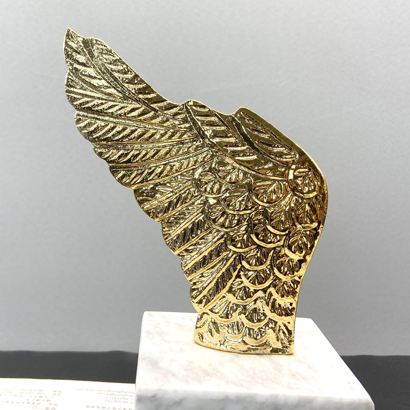 Gold Wing on Marble Bookend