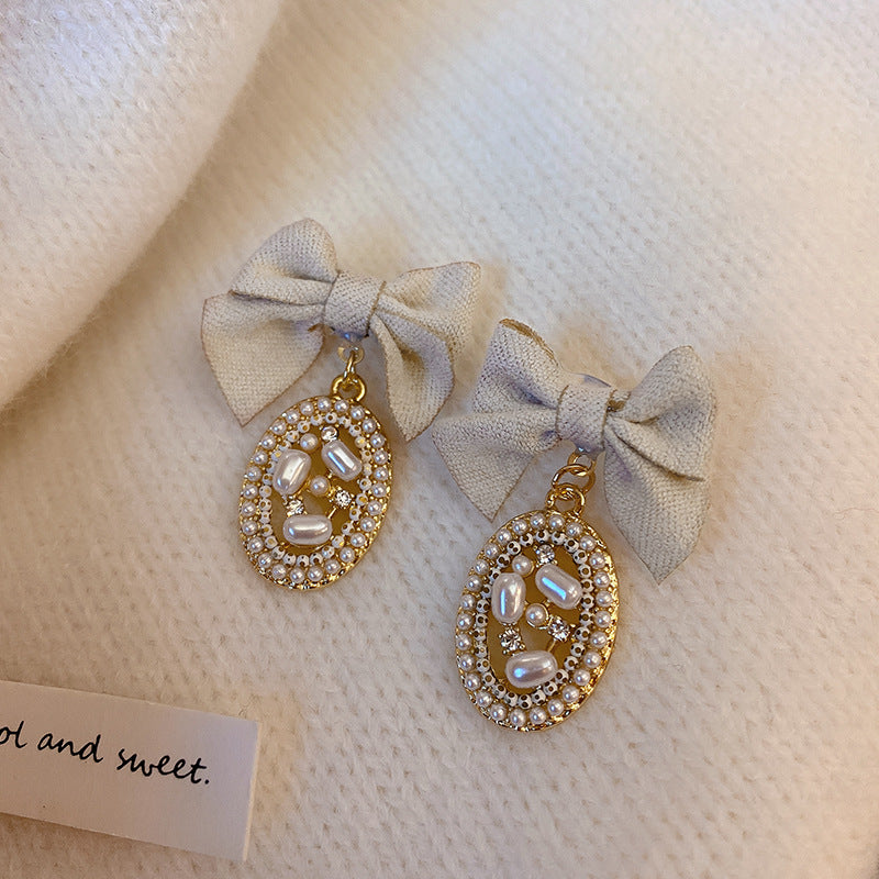Elegant Bow Pearl Dangle Earrings