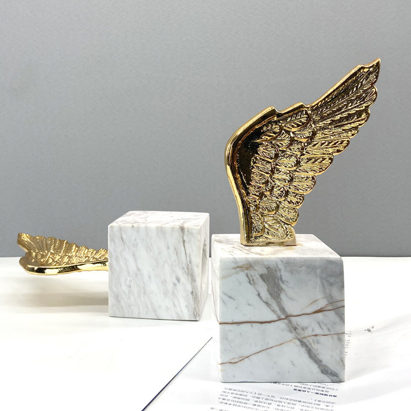 Gold Wing on Marble Bookend